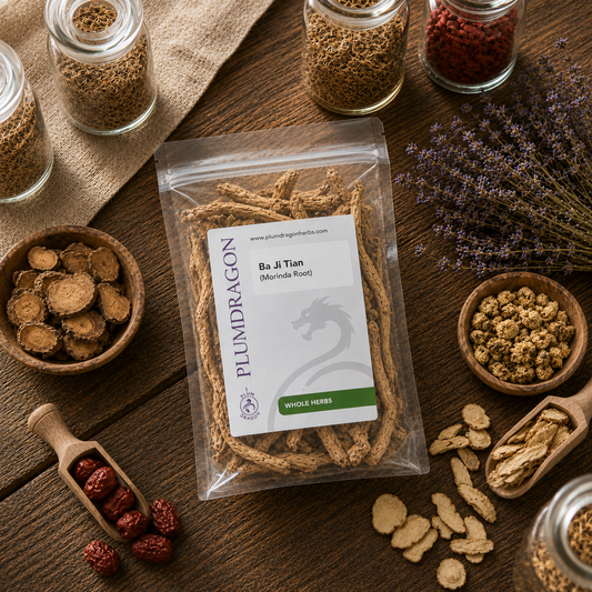Packaged Ba Ji Tian (Morinda Root) with a Plum Dragon label on a wooden surface with various dried herbs.