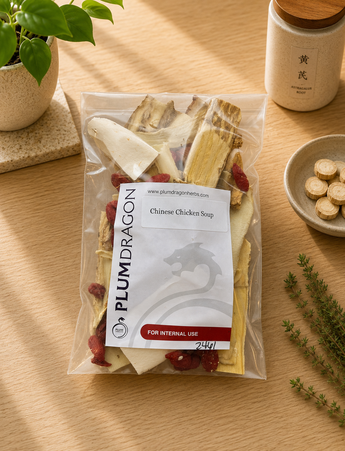 Chinese Herbs for Chicken Soup in Plum Dragon Packaging on apothecary counter
