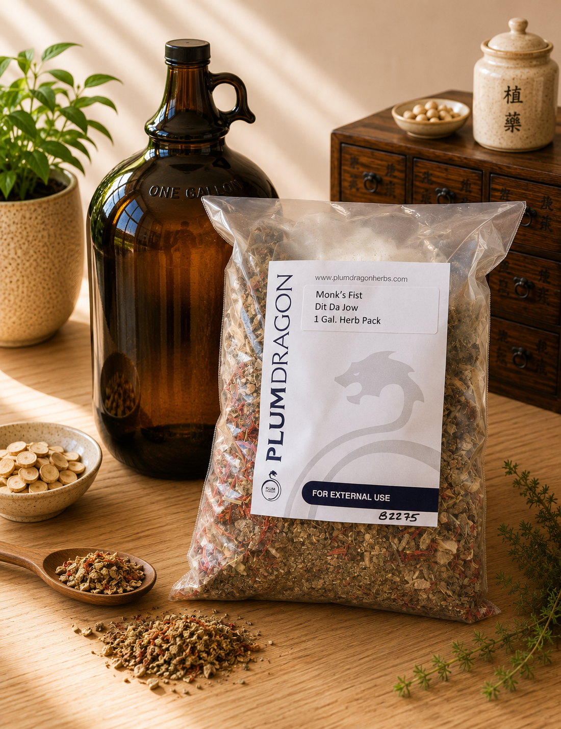 Monk's Fist Dit Da Jow Herbs and 1 Gallon Jug on apothecary counter