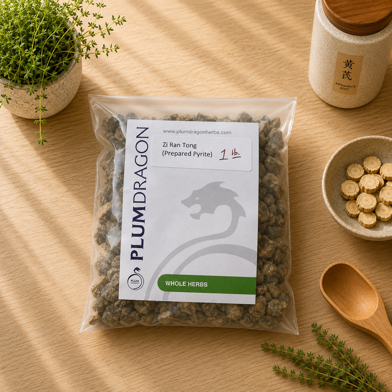 Zi Ran Tong (pyrite) 1 lb. in Plum Dragon packaging on apothecary counter