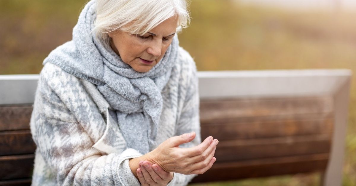 A lady experience arthritis in cold weather.