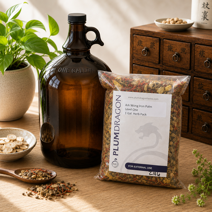 Ark Wong Iron Palm Dit Da Jow and 1 Gallon Jug on apothecary counter