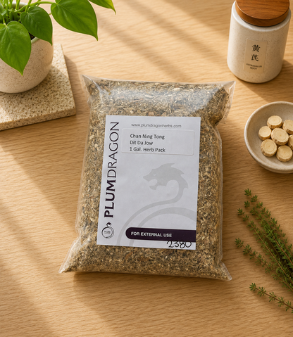 Chan Ning Tong Dit Da Jow in Plum Dragon packaging on apothecary counter