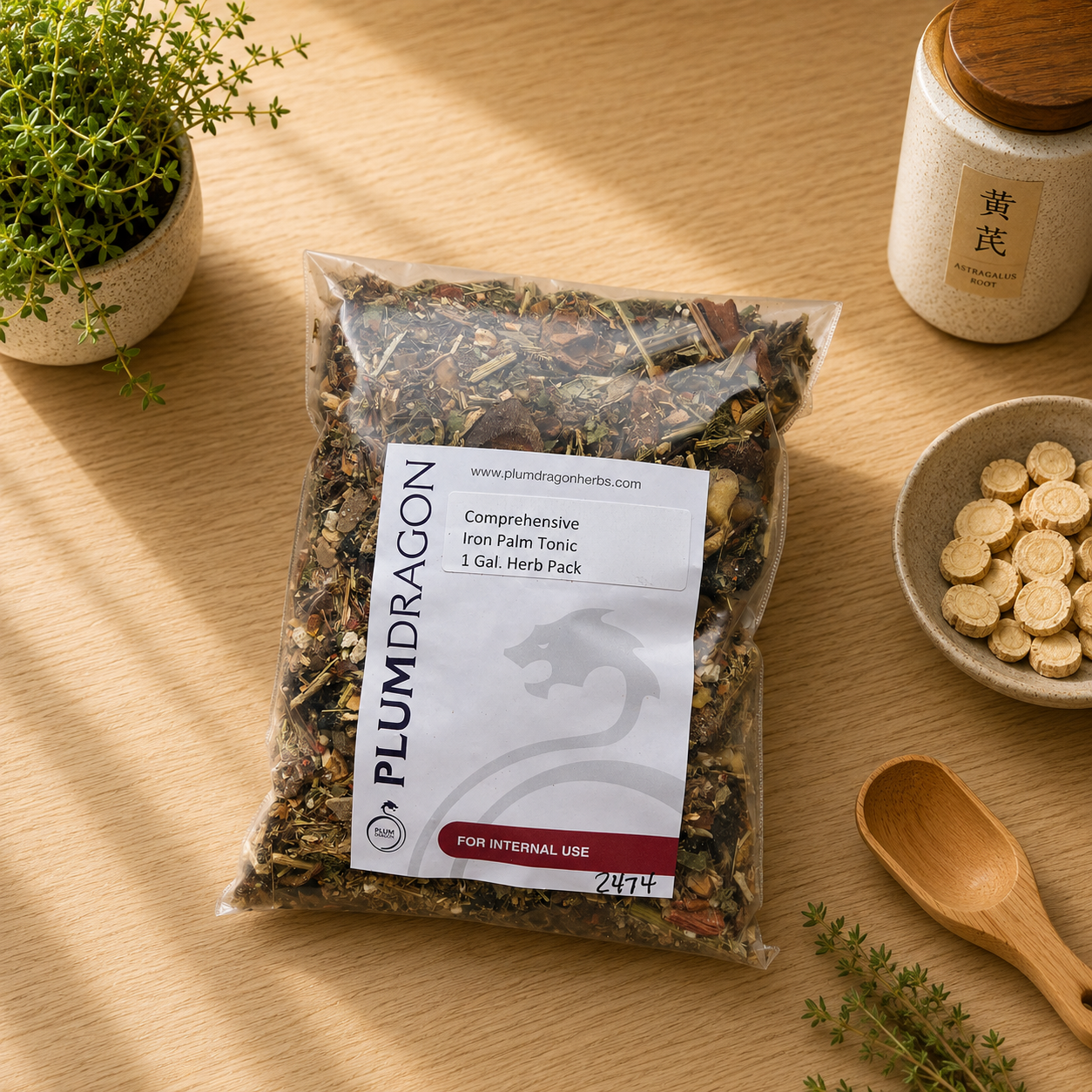 Comprehensive Iron Palm Tonic herb kit in Plum Dragon packaging on apothecary counter