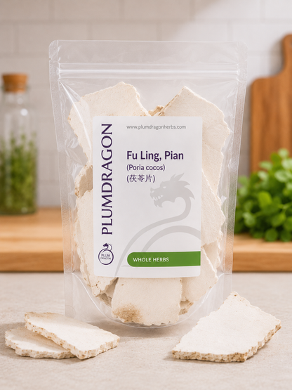 Packaged Fu ling (poria cocos) slices with Plum Dragon branding on a neutral background