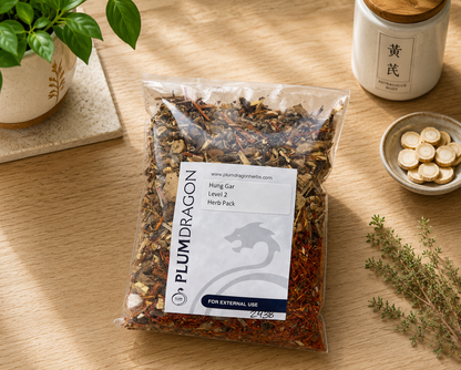 Hung Gar Herbs in Plum Dragon Packaging on Apothecary Counter