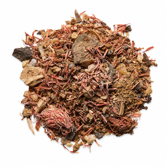 Pile of Monk's Fist Dit Da Jow herbs on white background