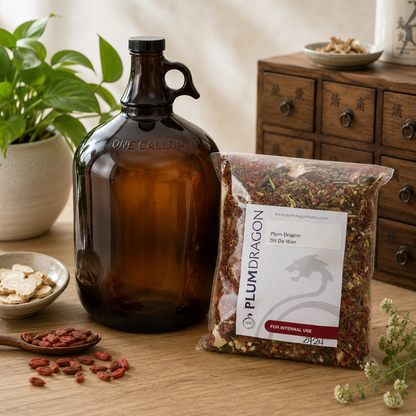 Plum Dragon Dit Da Wan and 1 Gallon Amber Glas Jug on apothecary counter