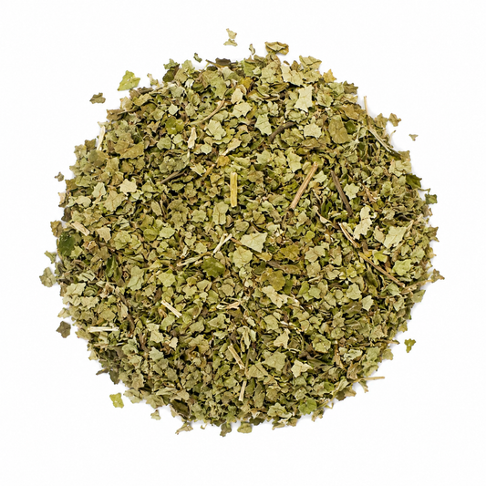 Pile of cut and sifted raspberry leaf tea on white background