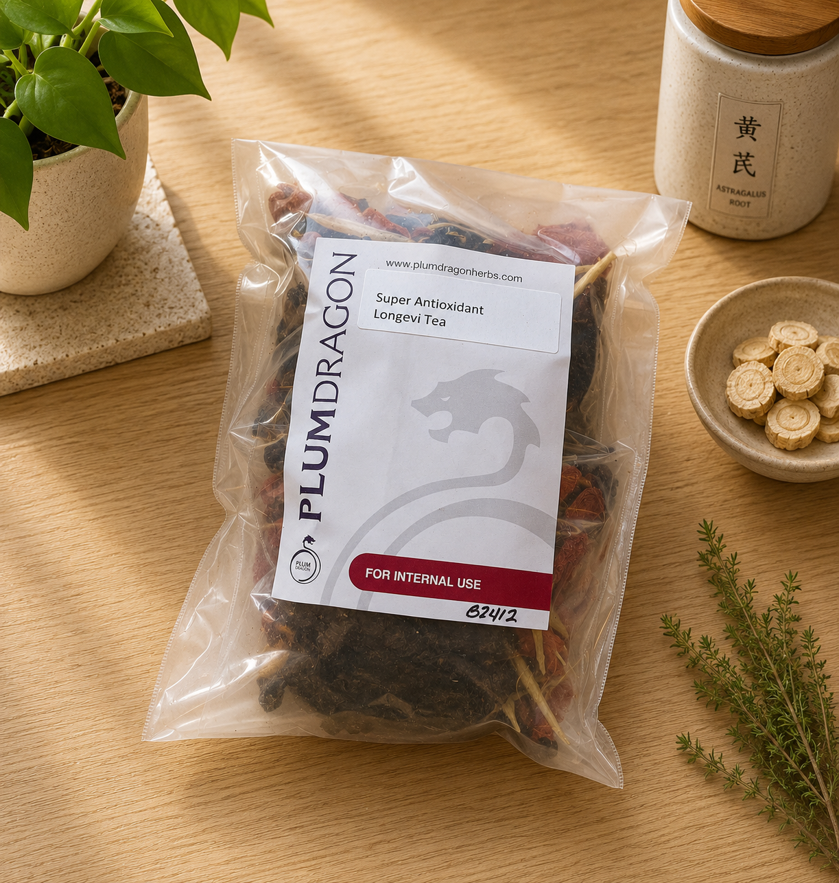 Super Antioxidant Longevi-Tea in Plum Dragon packaging on apothecary counter