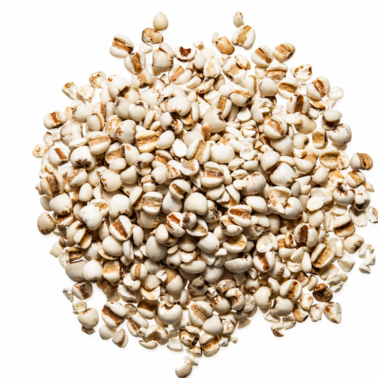 Pile of Yi Yi Ren (Coix Seed) on a white background