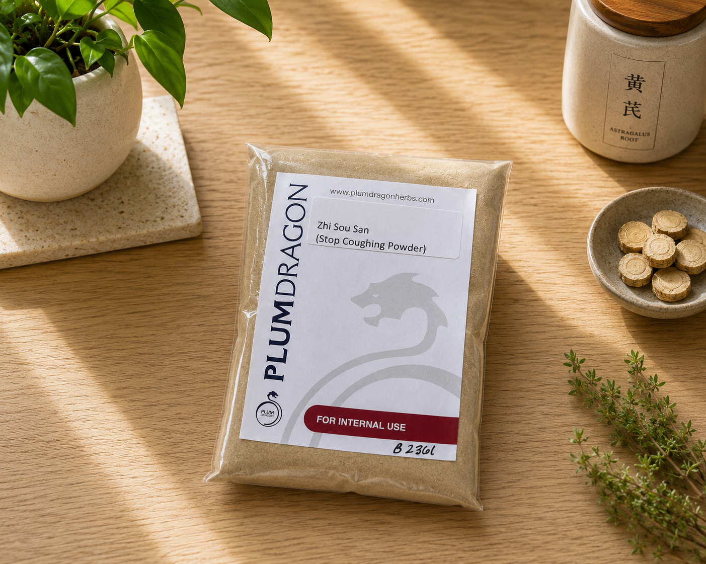 Zhi Sou San powder in Plum Dragon package on apothecary counter